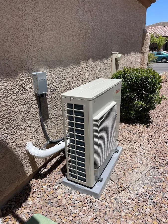 Residential air conditioning condenser unit in Mont Belvieu